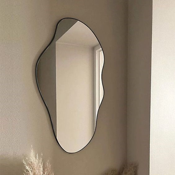 Wavy Frameless Asymmetrical Wall Mirror.